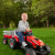 Case ih lil tractor  trailer boy outdoors r facing