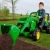 Jd front loader outdoors a boy l facing cropped