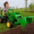 Jd front loader outdoors a girl r facing cropped